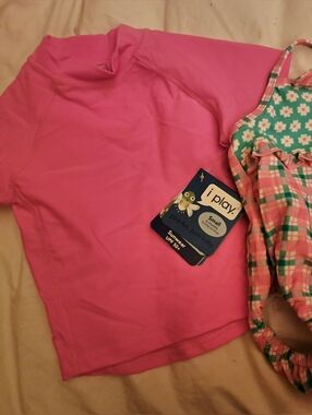 i play. NWT Rashguard And Good Condition Swimsuit